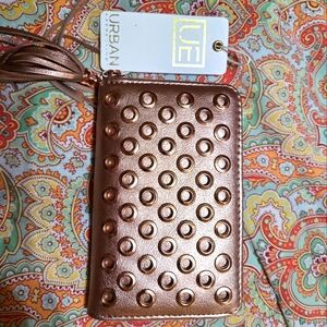 Urban Expressions rose gold grommet wallet